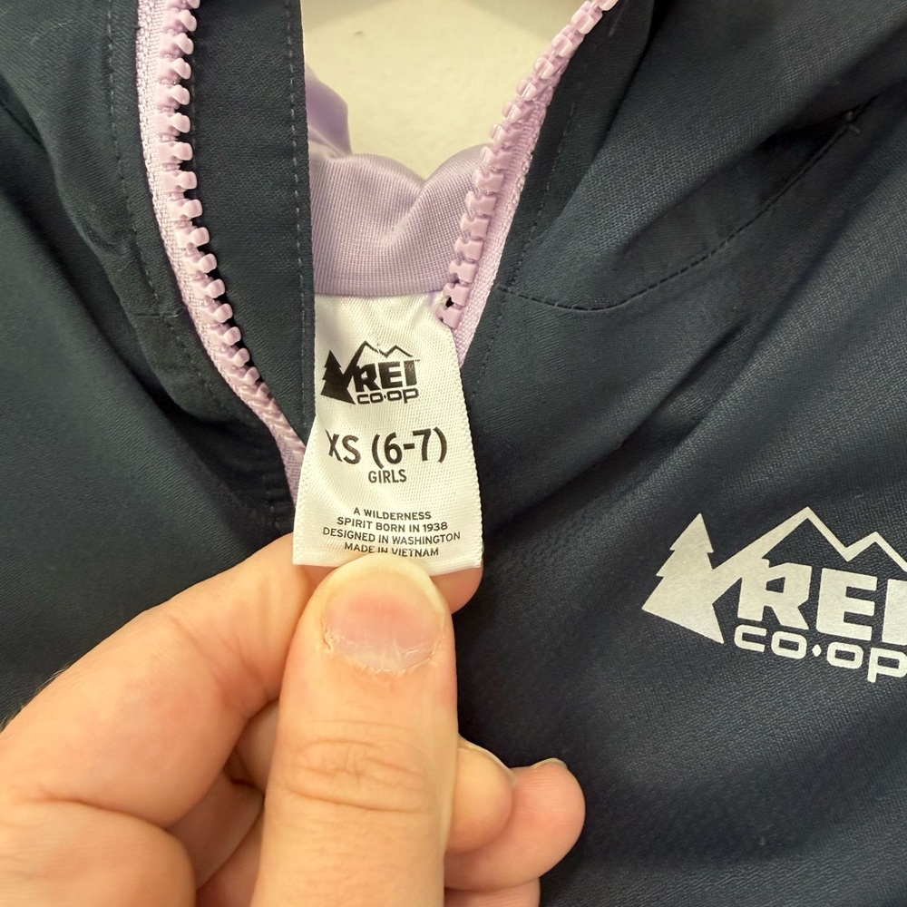 REI Kids Navy Raincoat with Light Purple Zipper - Picture 2 of 4